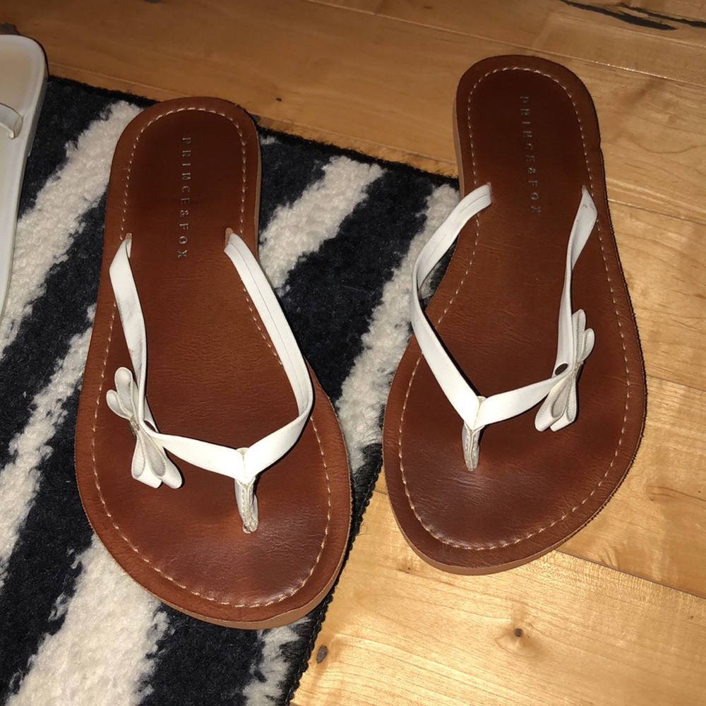 brown and white sandals